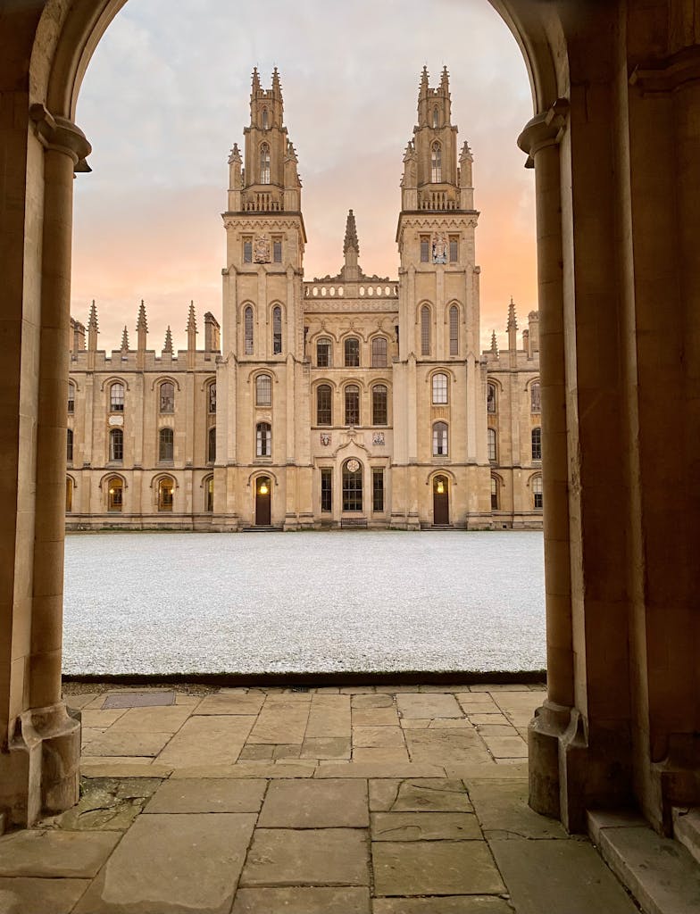 Elegant view of the All Souls College facade at Oxford, showcasing Gothic architecture.