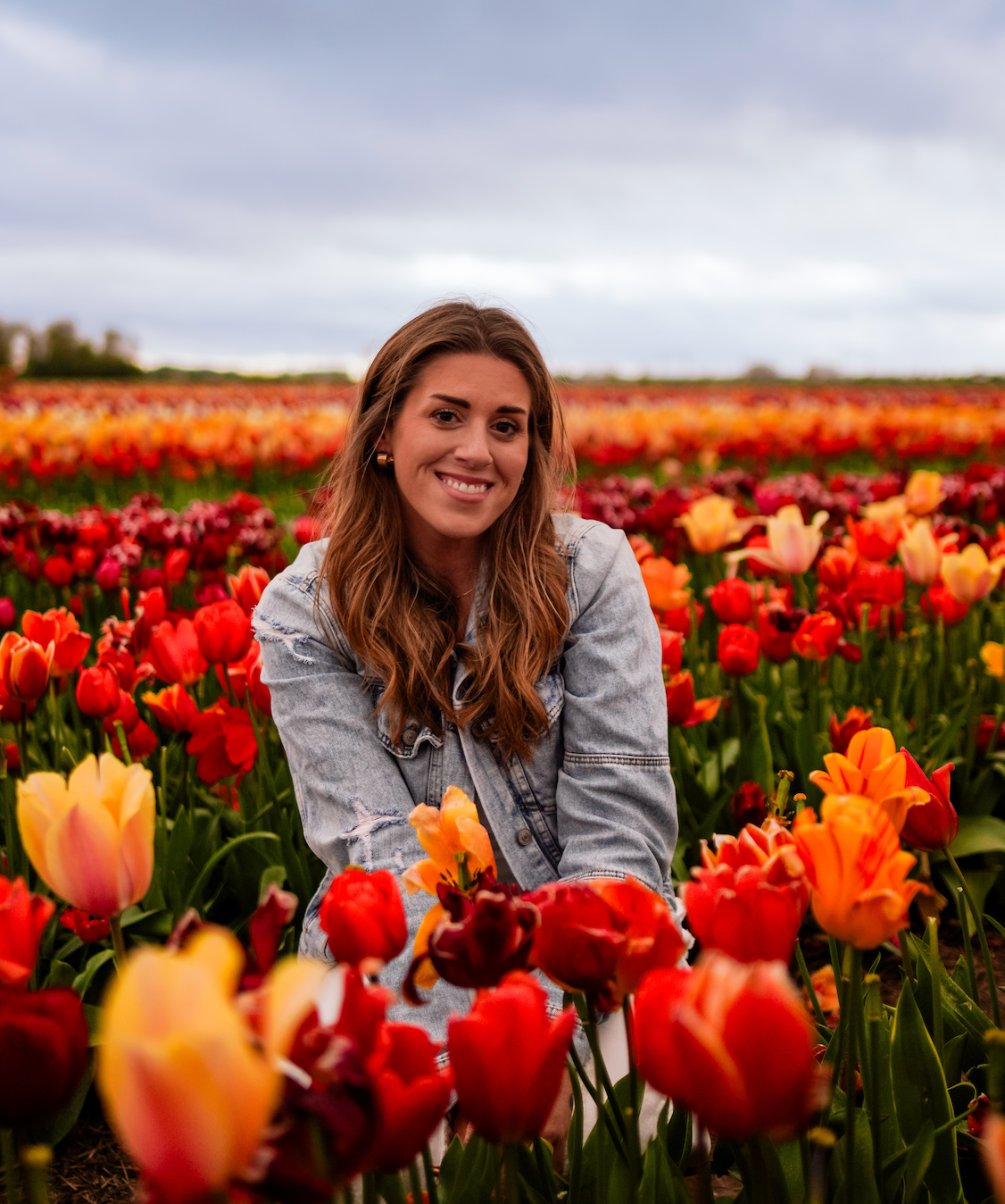 woman in a field of tulips