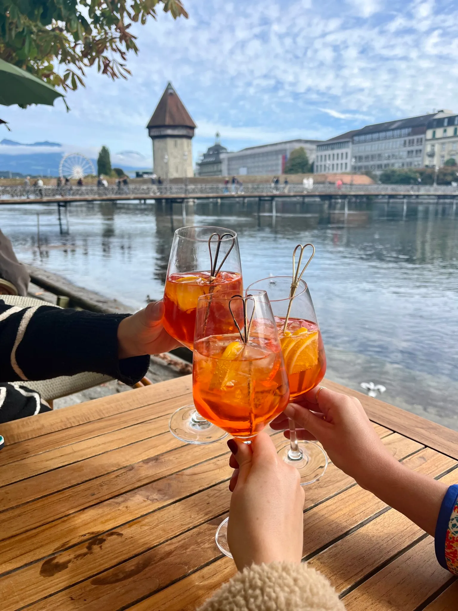 three glasses cheersing